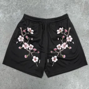 Printed slouchy mesh track shorts